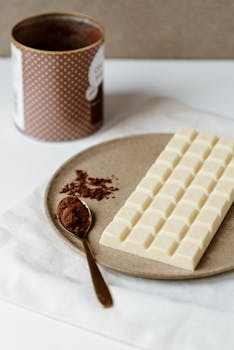 White chocolate and cocoa on plate